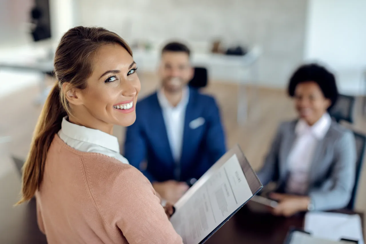 young happy woman having job interview office