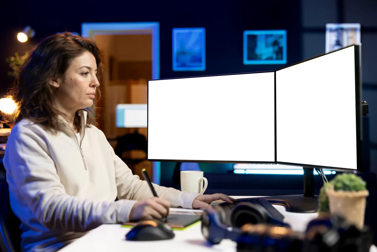 photographer using photo editing software mockup multi monitors setup
