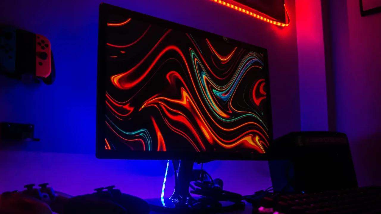 Gaming monitor with a colorful display, illustrating Monitor Response Time for smooth visuals and reduced motion blur.