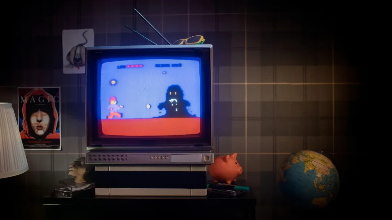 Retro CRT television displaying an action Indie Game with pixel-art graphics in a nostalgic gaming room.