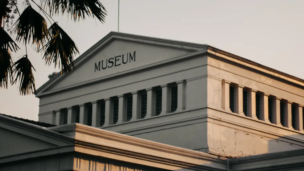 Historic museum building with classic architecture, representing a Game Preservation Museum dedicated to preserving video game history, retro gaming, and digital culture.