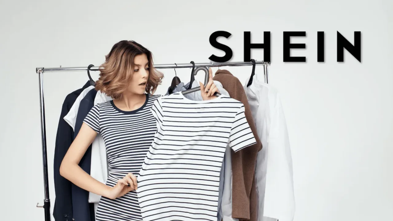 A woman with a surprised expression finds a perfect match while browsing her curated selection of Free SHEIN Clothes, eager to update her stylish wardrobe.