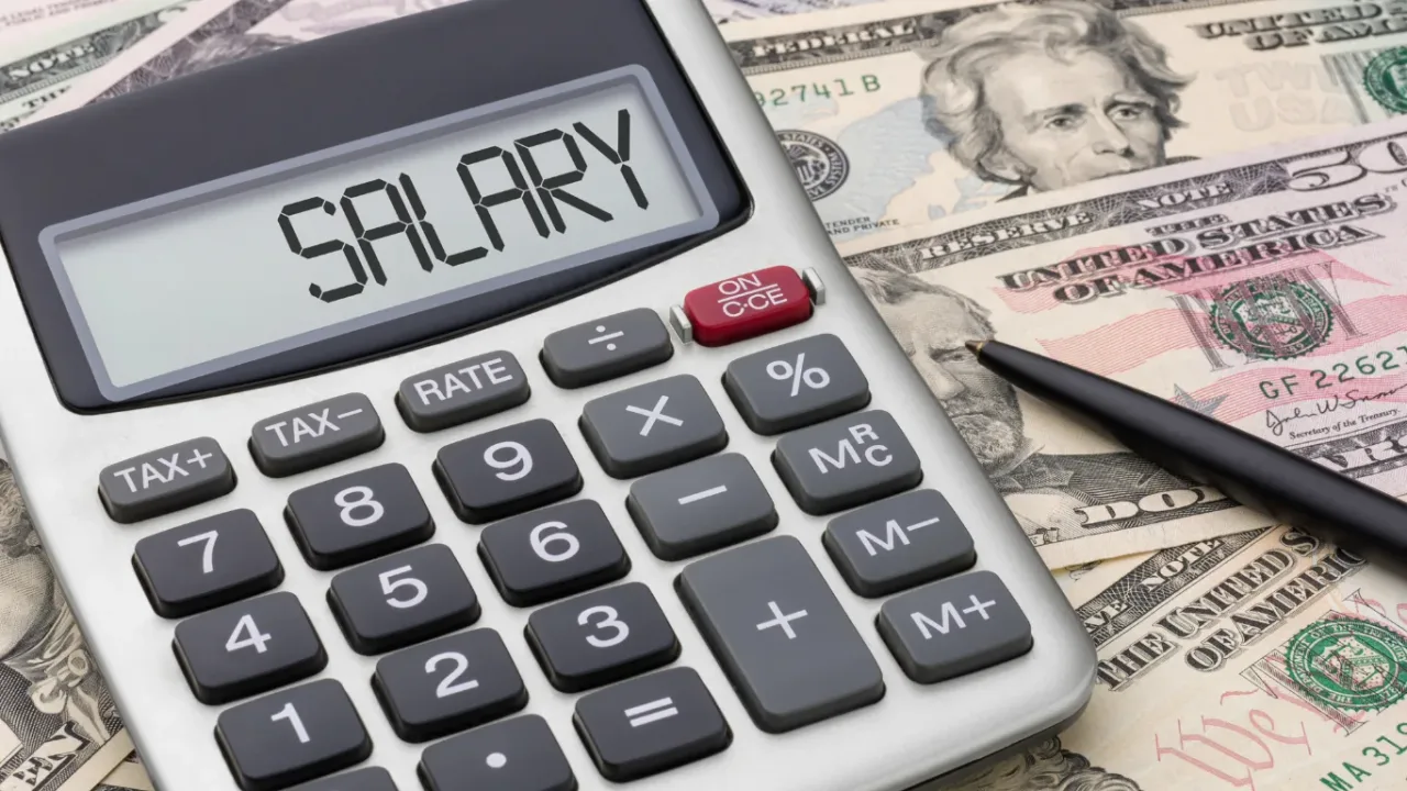 Player Salary Transparency represented by a calculator displaying “SALARY” alongside U.S. dollar bills.