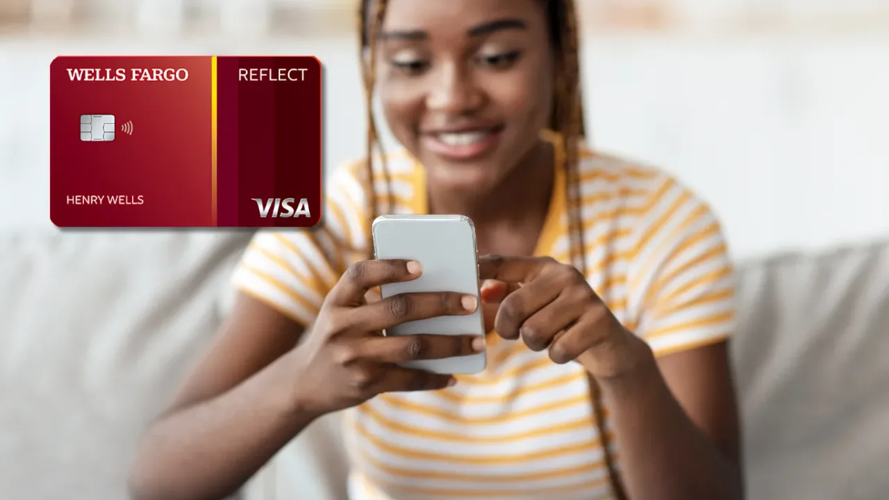 Smiling young woman in a striped yellow shirt using her smartphone on a couch, next to a red Wells Fargo Reflect Visa credit card.