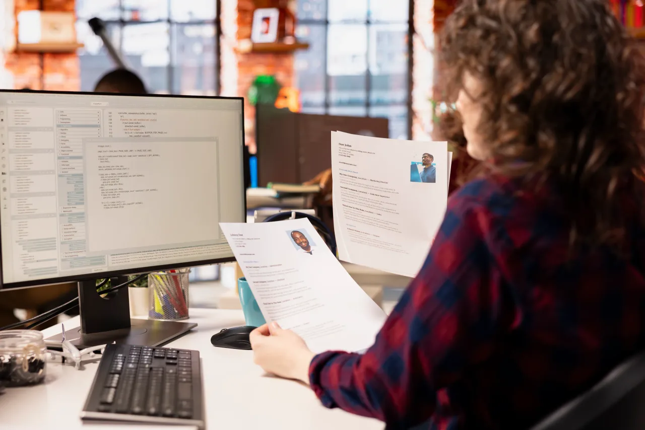 startup hr worker identifying right candidates job opening reviewing resume